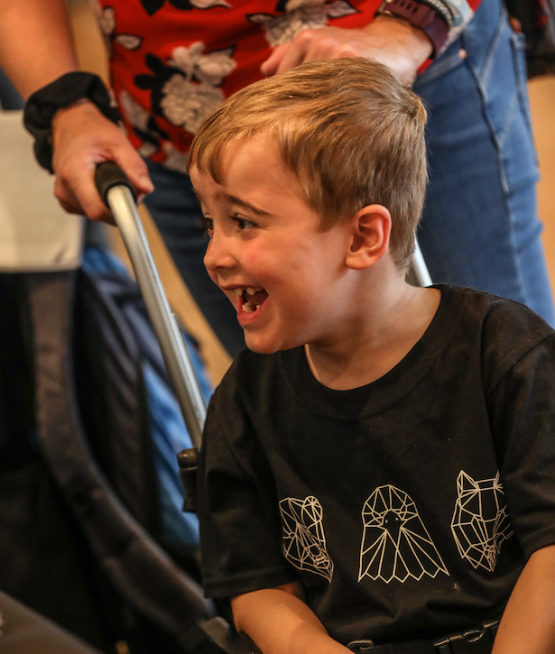 Young boy with DMD in wheelchair