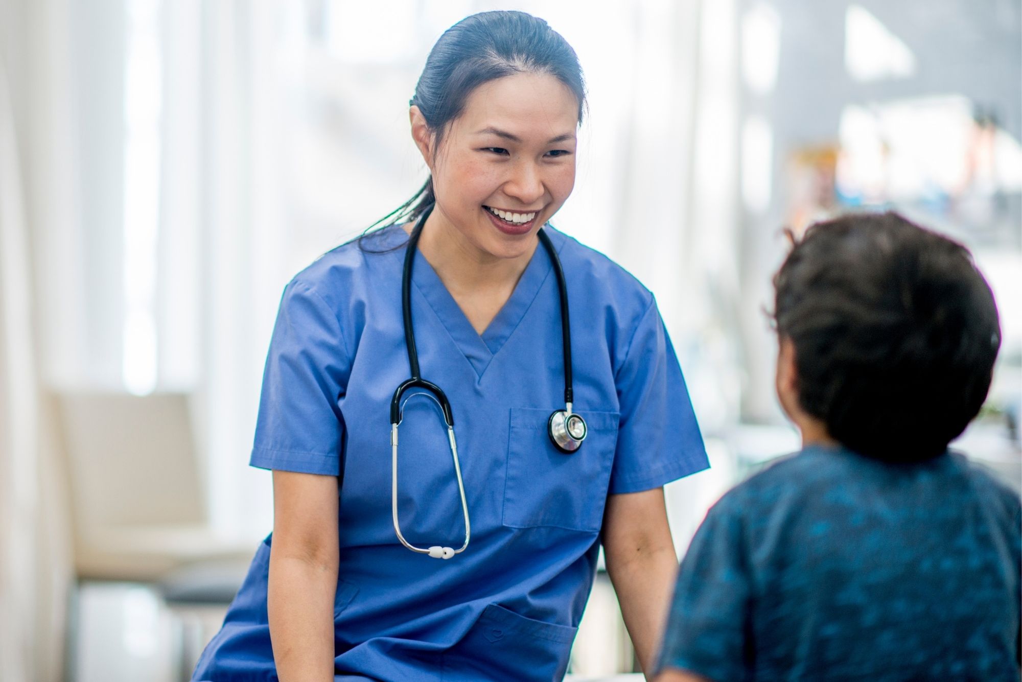 Doctor with young boy