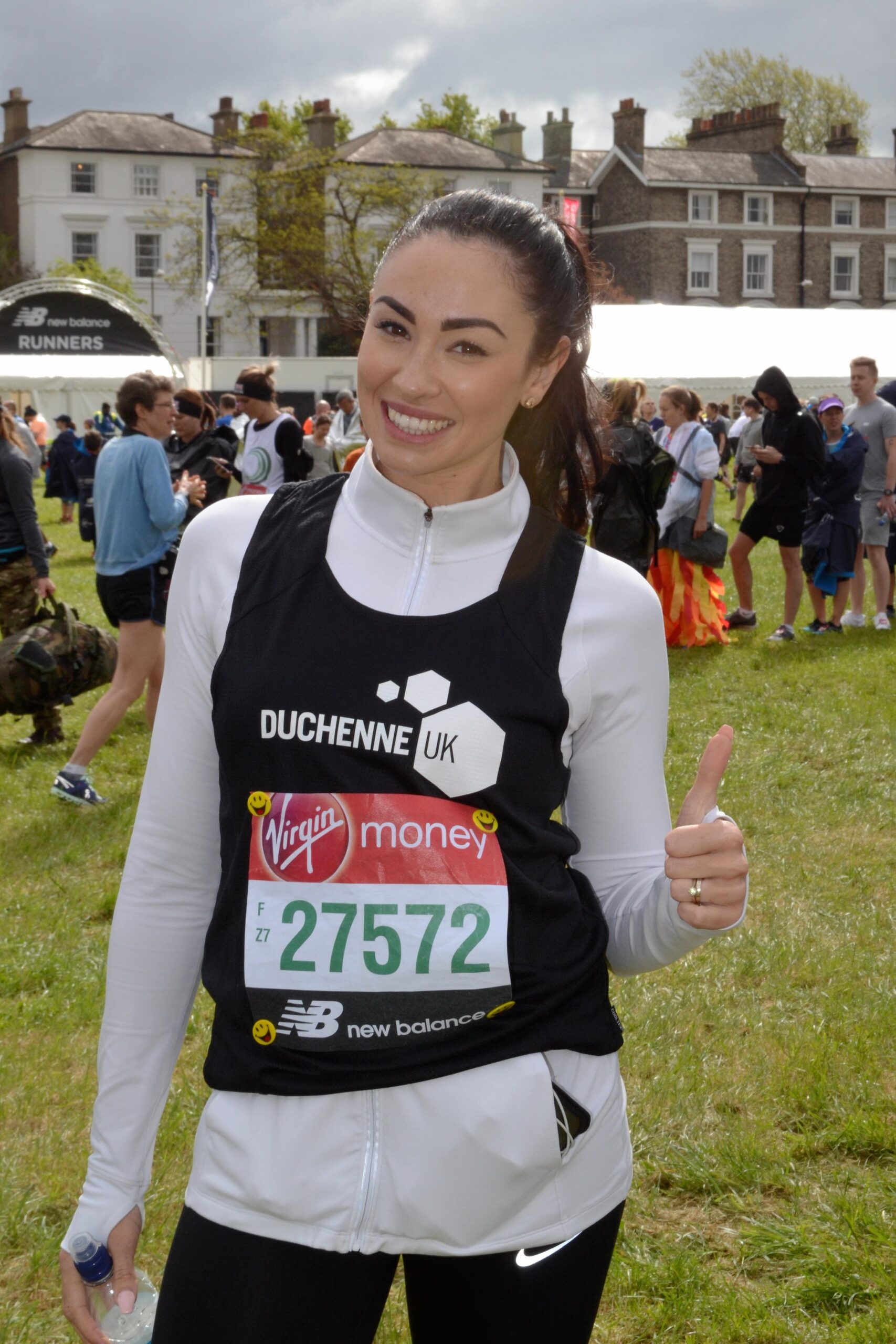Hannah posing with a thumbs up before London Marathon