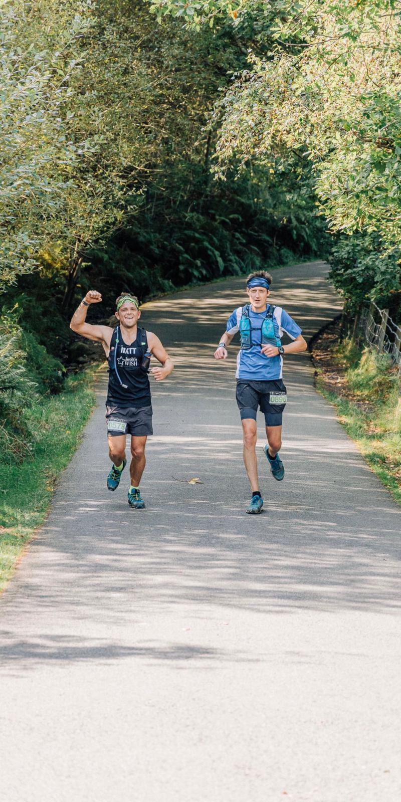 2 Marathon Runners on a country road