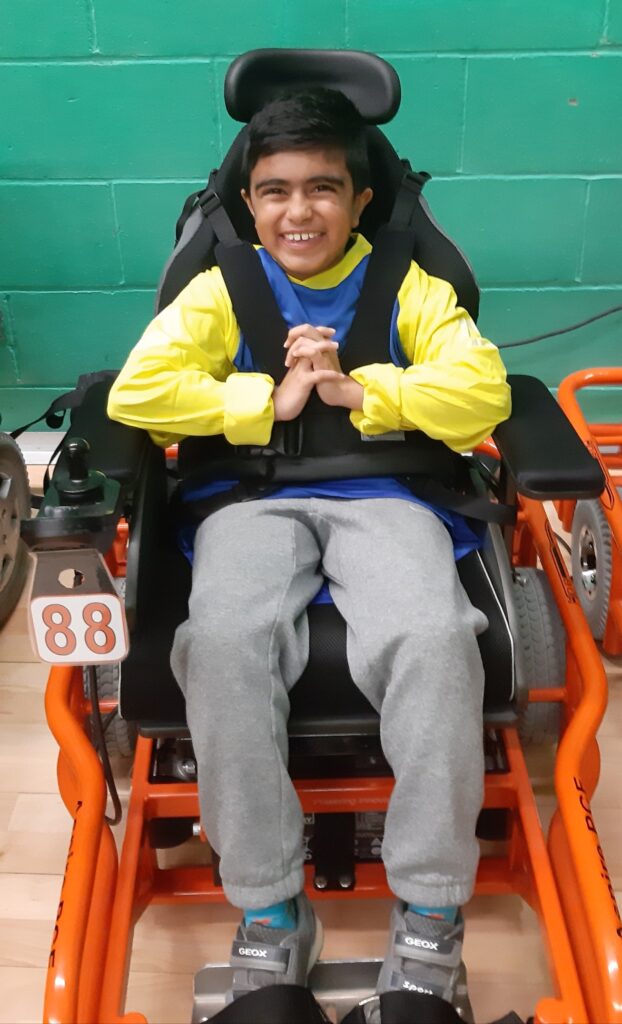 Shiv age 11 playing powerchair football